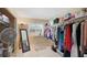 Spacious walk-in closet with shelving and ample storage, naturally lit at 5562 Hayden Blvd, Sarasota, FL 34232
