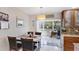 Cozy dining area featuring lots of natural light and a view to the backyard at 5562 Hayden Blvd, Sarasota, FL 34232