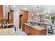 Stylish kitchen with sleek cabinetry, granite countertops, and modern appliances at 5562 Hayden Blvd, Sarasota, FL 34232