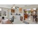 Bright open kitchen featuring a breakfast nook and connecting living space with granite countertops at 5562 Hayden Blvd, Sarasota, FL 34232