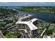 Stunning aerial view of the waterfront property, surrounded by lush landscapes and tranquil waterscapes at 5855 Midnight Pass Rd # 303, Sarasota, FL 34242