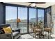 Balcony with outdoor seating and a view of the pool area at 5855 Midnight Pass Rd # 303, Sarasota, FL 34242