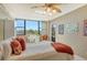 This bedroom offers large windows and scenic views, with plenty of natural light at 5855 Midnight Pass Rd # 303, Sarasota, FL 34242