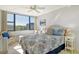 Bright bedroom offers a large window with views and a cozy sitting area at 5855 Midnight Pass Rd # 303, Sarasota, FL 34242