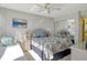 This bright bedroom offers large windows and a mirrored closet for added space at 5855 Midnight Pass Rd # 303, Sarasota, FL 34242