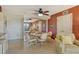 Cozy dining area with a mirrored wall and seating for six, perfect for Gathering meals or entertaining guests at 5855 Midnight Pass Rd # 303, Sarasota, FL 34242