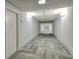 Clean, well-lit hallway with patterned carpeting and access to multiple units at 5855 Midnight Pass Rd # 303, Sarasota, FL 34242