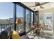 Relaxing screened lanai with comfortable seating and beautiful views, perfect for enjoying the outdoors at 5855 Midnight Pass Rd # 303, Sarasota, FL 34242