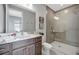 Modern bathroom showcasing a glass shower enclosure, stylish vanity, and contemporary fixtures at 6027 White Mangrove Ln, Bradenton, FL 34210