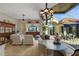 Dining area with pool view at 612 Weston Pointe Ct, Longboat Key, FL 34228