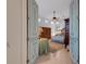 View into a beautiful main bedroom featuring light hardwood floors, a ceiling fan, and neutral-toned decor at 612 Weston Pointe Ct, Longboat Key, FL 34228