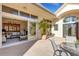 Outdoor patio with dining area, and living room view at 612 Weston Pointe Ct, Longboat Key, FL 34228