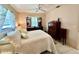 Comfortable bedroom with neutral tones and matching dresser and nightstand set at 6924 Tuxedo St, Englewood, FL 34224