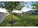 Well-maintained community grounds with lush green spaces and inviting amenities at 7547 Campus Cv, Sarasota, FL 34243