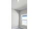 Comfortable bedroom featuring neutral carpet and a window for plenty of natural light at 818 170Th E Ct, Bradenton, FL 34212