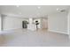 A bright kitchen area showcases stainless steel appliances, an island with a sink, and modern finishes at 818 170Th E Ct, Bradenton, FL 34212