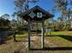 East River Information Kiosk located in a lush green park area surrounded by trees and various signage at 9031 Hilolo Ln, Venice, FL 34293