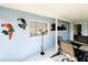 Outdoor lanai featuring tropical decor and plenty of natural light at 9031 Hilolo Ln, Venice, FL 34293