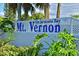 Mt. Vernon On Sarasota Bay neighborhood sign framed by lush greenery at 9414 Andover Cir, Bradenton, FL 34210