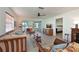 Bright living room with a view to the lanai and a peek into the bedroom, creating an open feel at 9414 Andover Cir, Bradenton, FL 34210
