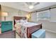 Cozy bedroom with nautical decor, ceiling fan and ample natural light at 3807 41St Street W Ct # 52, Bradenton, FL 34205