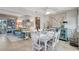 Open floor plan of the dining area connected to the living room and kitchen at 3807 41St Street W Ct # 52, Bradenton, FL 34205