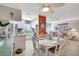 Open-concept layout connects dining and living areas, featuring a well-equipped kitchen and comfortable seating at 3807 41St Street W Ct # 52, Bradenton, FL 34205