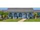 Charming single-story home with arched entryway, well-maintained landscaping, and inviting curb appeal at 3807 41St Street W Ct # 52, Bradenton, FL 34205