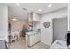 Bright kitchenette area features marble countertops, white cabinetry, and open design to the dining area at 3807 41St Street W Ct # 52, Bradenton, FL 34205