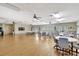 Bright meeting room with ceiling fans, and tables with chairs perfect for community gatherings at 3807 41St Street W Ct # 52, Bradenton, FL 34205