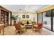 Comfortable seating in a common area with nice decor and views to the outside at 1001 Benjamin Franklin Dr # 511, Sarasota, FL 34236