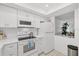 Well-maintained kitchen with modern appliances and plenty of storage at 1001 Benjamin Franklin Dr # 511, Sarasota, FL 34236