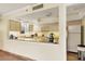 Cozy kitchen features sleek countertop, bright overhead lighting, and essential appliances at 1001 Benjamin Franklin Dr # 511, Sarasota, FL 34236
