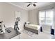 Bedroom featuring a work-from-home setup, ample natural light, and neutral walls at 1022 Overlook Ct, Bradenton, FL 34208
