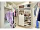 Walk-in closet with custom shelving, ample storage, and well-organized layout at 1022 Overlook Ct, Bradenton, FL 34208