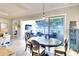 Cozy dining area with patio access and lake view at 1022 Overlook Ct, Bradenton, FL 34208