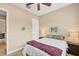Bedroom featuring a queen bed, neutral walls, carpet, and ceiling fan at 1290 Cielo Ct, North Venice, FL 34275