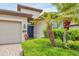 Charming single-story home featuring a private front entrance, attached garage, and well-manicured landscaping at 1290 Cielo Ct, North Venice, FL 34275