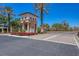 Elegant gated entrance with landscaped grounds and a guardhouse, ensuring security and privacy for residents at 1290 Cielo Ct, North Venice, FL 34275