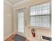 Bright entryway with tile floors, neutral walls and a fire extinguisher for safety at 1325 Gulf Dr N # 247, Bradenton Beach, FL 34217