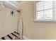Small closet with a shelf and ironing board at 1325 Gulf Dr N # 248, Bradenton Beach, FL 34217