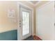 Bright entryway with a white door leading to the outside and a closet at 1325 Gulf Dr N # 248, Bradenton Beach, FL 34217