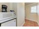 Small kitchenette equipped with a microwave, mini-fridge, and coffee maker at 1325 Gulf Dr N # 248, Bradenton Beach, FL 34217