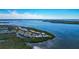 Spectacular aerial view of waterfront condos nestled along the bay and waterways at 1389 Perico Point Cir # 140, Bradenton, FL 34209