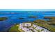 Beautiful aerial shot showcasing waterfront condos surrounded by lush mangroves at 1389 Perico Point Cir # 140, Bradenton, FL 34209