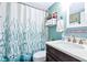 Bathroom featuring a decorative shower curtain and matching wall decor at 1389 Perico Point Cir # 140, Bradenton, FL 34209