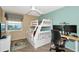 Bright bedroom with bunk beds, a desk, a ceiling fan, and nice ocean themed decoration at 1389 Perico Point Cir # 140, Bradenton, FL 34209
