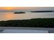 Tranquil sunset view overlooking the water and small islands at 1389 Perico Point Cir # 140, Bradenton, FL 34209