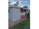 Exterior view of the property highlighting the outdoor space and surrounding landscape at 1674 University Pkwy # 389, Sarasota, FL 34243