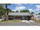 Community office building with neat landscaping and mailboxes at 1674 University Pkwy # 389, Sarasota, FL 34243